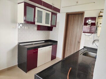 Kitchen in 2 BHK Apartment at Majestique Landmark Miami, Dhayari – for Rent