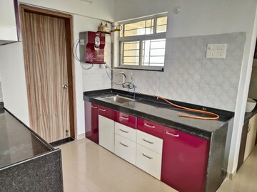 Kitchen in 2 BHK Apartment at Majestique Landmark Miami, Dhayari – for Rent