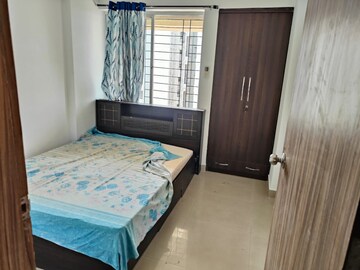 Bedroom in 2 BHK Apartment at Majestique Landmark Miami, Dhayari – for Rent