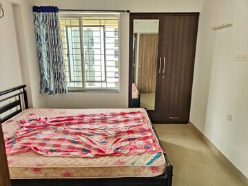 Bedroom in 2 BHK Apartment at Majestique Landmark Miami, Dhayari – for Rent