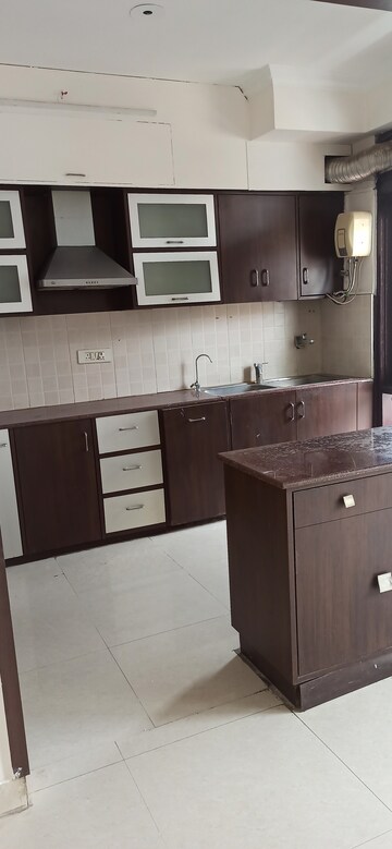 Kitchen in 4 BHK Apartment at Abhinandan CGHS, Sector 51 – for Rent