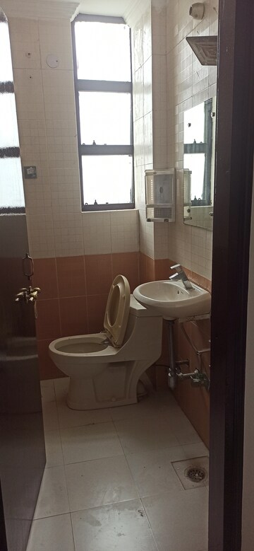Bathroom in 4 BHK Apartment at Abhinandan CGHS, Sector 51 – for Rent