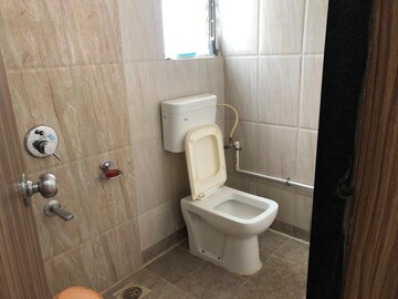 Bathroom in 2 BHK Apartment at Majestique Landmark Miami, Dhayari – for Rent