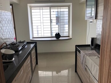 Kitchen in 2 BHK Apartment at Majestique Landmark Miami, Dhayari – for Rent