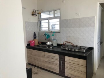 Kitchen in 2 BHK Apartment at Majestique Landmark Miami, Dhayari – for Rent