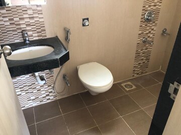 Bathroom in 2 BHK Apartment at Majestique Landmark Miami, Dhayari – for Rent