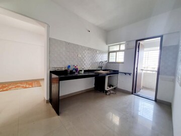 Kitchen in 2 BHK Apartment at Majestique Landmark Miami, Dhayari – for Rent
