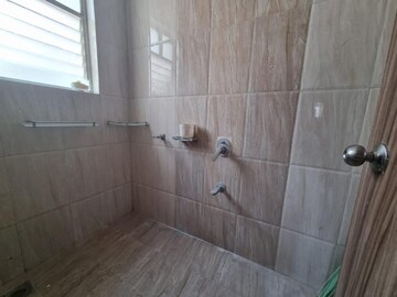 Bathroom in 2 BHK Apartment at Majestique Landmark Miami, Dhayari – for Rent