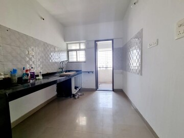 Kitchen in 2 BHK Apartment at Majestique Landmark Miami, Dhayari – for Rent