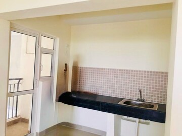 Kitchen in 2 BHK Apartment at Jaypee Greens Aman, Sector 151 – for Sale
