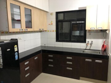 Kitchen in 2 BHK Apartment at Prayeja City CHS, Nanded Fata – for Rent