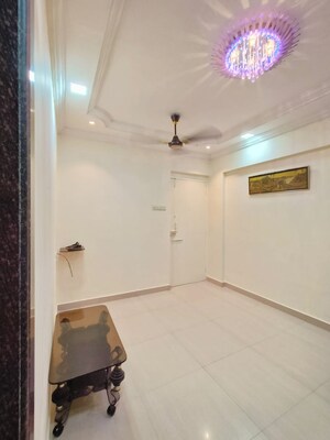 Living Room in 1 BHK Apartment at Swastik Park CHS, Ghodbunder Road – for Sale