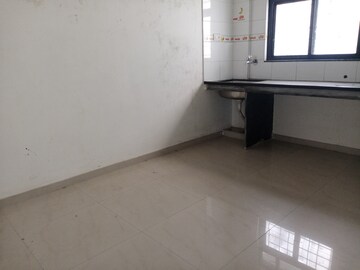 Kitchen in 1 BHK Apartment at Prayeja City CHS, Nanded Fata – for Rent