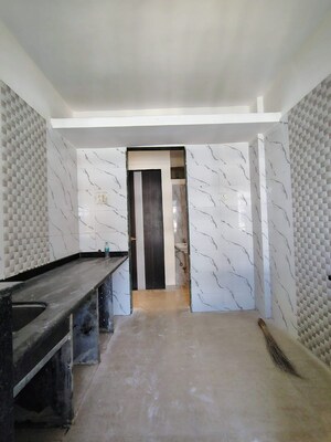 Kitchen in 1 BHK Apartment at Mohan Palms, Katrap – for Sale