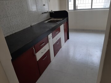 Kitchen in 2 BHK Apartment at Rajyog CHS, Vadgaon Budruk – for Rent