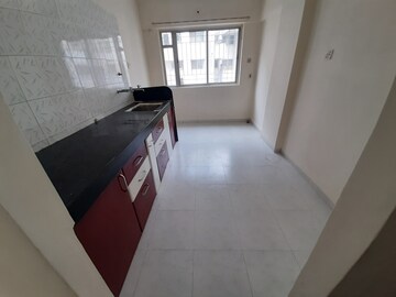 Kitchen in 2 BHK Apartment at Rajyog CHS, Vadgaon Budruk – for Rent