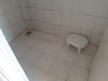 Bathroom in 2 BHK Apartment at Rajyog CHS, Vadgaon Budruk – for Rent