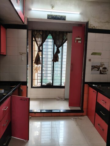 Kitchen in 2.5 BHK Apartment at Mahavir CHS Nerul, Nerul – for Rent