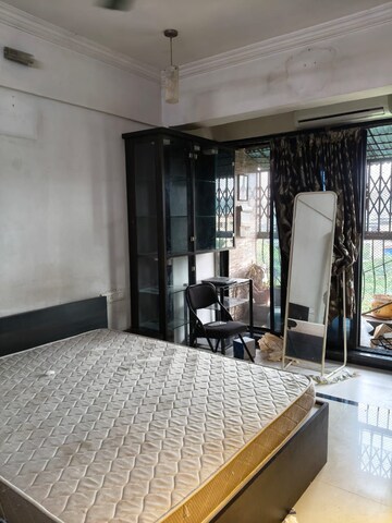 Bedroom in 2.5 BHK Apartment at Mahavir CHS Nerul, Nerul – for Rent