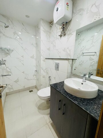 Bathroom in 3 BHK Builder Floor at Ameya One, Sector 42 – for Rent