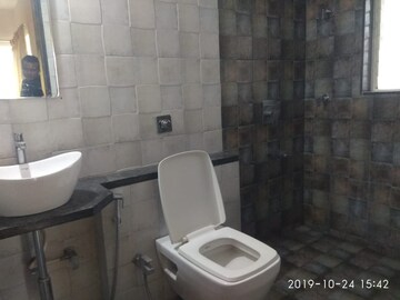 Bathroom in 2 BHK Apartment at Rawat Madhuli, Sinhagad – for Rent