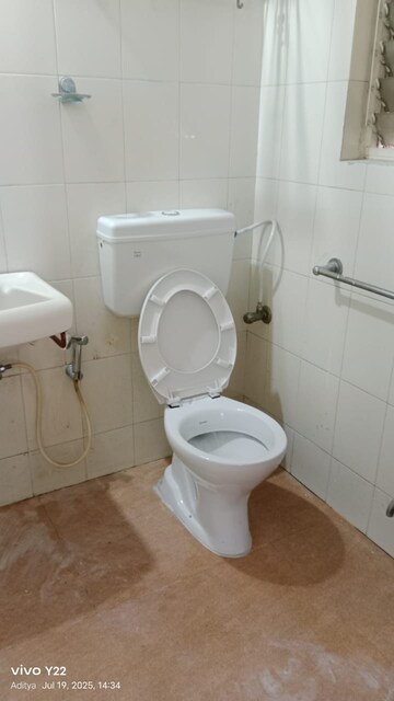 Bathroom in 2 BHK Apartment at Nimbaj Nagar CHS, Anand Nagar – for Rent