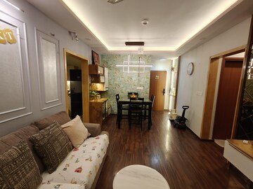 Living Room in 2 BHK Apartment at Bhartiya Nikoo Homes Phase 2, Thanisandra Main Road – for Rent