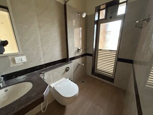 Bathroom in 2 BHK Apartment at Raheja Interface Heights, Mindspace – for Sale