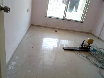 Living Room in 1 BHK Apartment at Amrut Ganga, Sinhagad – for Rent
