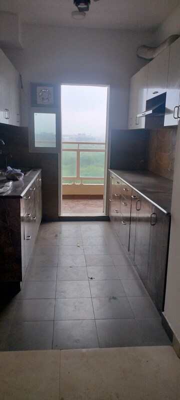 Kitchen in 3 BHK Apartment at Elite Golf Green, Sector 79 – for Rent