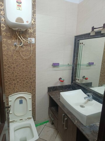 Bathroom in 3 BHK Builder Floor at Kalkaji – for Rent