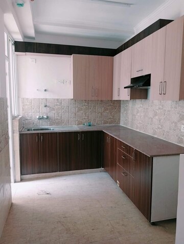 Kitchen in 2 BHK Apartment at Amrapali Golf Homes, Sector 4 Greater Noida – for Rent