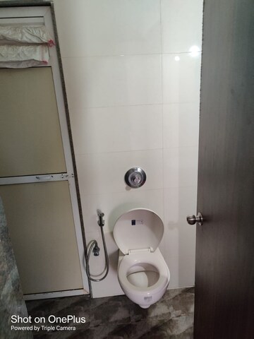 Bathroom in 1 BHK Apartment at Metropolis Aquaris Phase 1, Kasarvadavali – for Rent