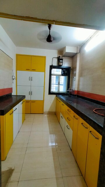 Kitchen in 2 BHK Apartment at Sanghvi Hills, Ghodbunder Road – for Rent