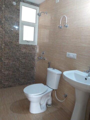 Bathroom in 3 BHK Apartment at Omaxe R2, Gomti Nagar – for Rent