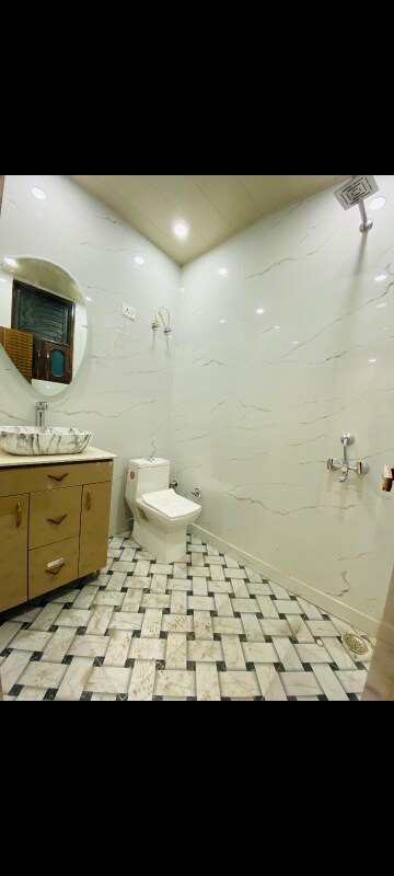 Bathroom in 3 BHK Builder Floor at Soho Awas Apartments, Gyan Khand I – for Sale
