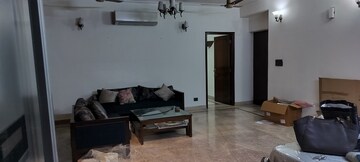 Living Room in 4 BHK Apartment at Amrapali Exotica, Sector 50 – for Rent