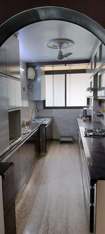 Kitchen in 4 BHK Apartment at Amrapali Exotica, Sector 50 – for Rent
