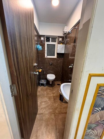 Bathroom in 1 BHK Apartment at Sai Siddhant CHS, Vasai West – for Rent