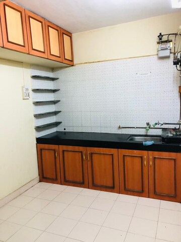 Kitchen in 1 BHK Apartment at Samarth Nagar, Wadgaon Sheri – for Rent