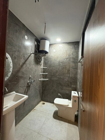 Bathroom in 3 BHK Apartment at Shri Devaji Residency, Dhakoli – for Rent