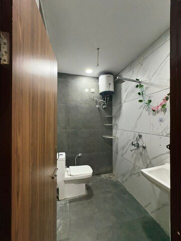 Bathroom in 3 BHK Apartment at Shri Devaji Residency, Dhakoli – for Rent