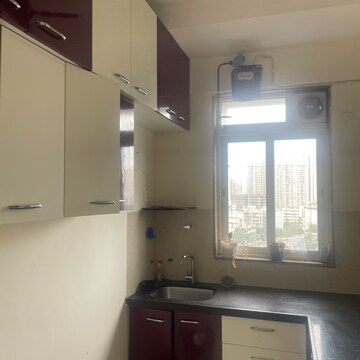 Kitchen in 1.5 BHK Apartment at Runwal Forests, Datar Colony – for Rent