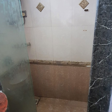Bathroom in 1 BHK Apartment at Kings Anand Dham, Nahur – for Rent