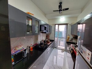 Kitchen in 2 BHK Apartment at Unique Aurum, Mira Road – for Sale