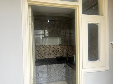 Bathroom in 2 BHK Apartment at Gulmohur Garden, Raj Nagar Extension – for Rent