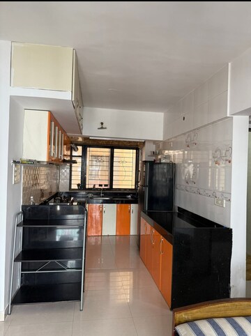Kitchen in 2 BHK Apartment at Magarpatta Sylvania, Hadapsar – for Rent