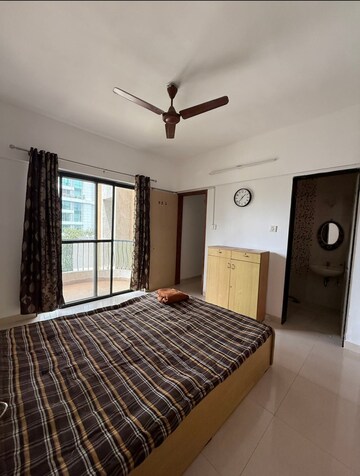 Master Bedroom in 2 BHK Apartment at Magarpatta Sylvania, Hadapsar – for Rent