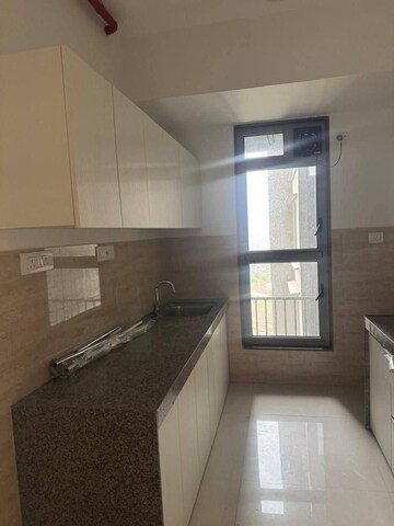 Kitchen in 1 BHK Apartment at Agarwal And Doshi Complex, Vasai West – for Sale