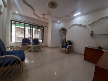 Living Room in 2 BHK Apartment at Nav Jyotirling CHS, Malad East – for Rent